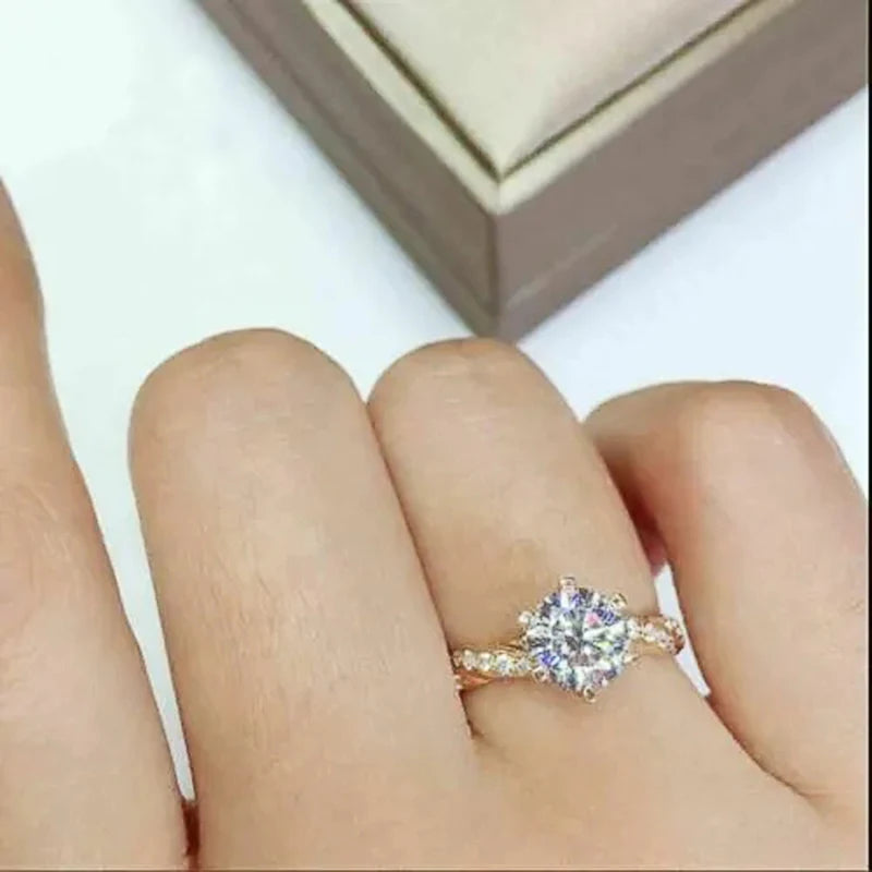 Woman wearing Huitan gold cubic zirconia ring – elegant everyday jewelry