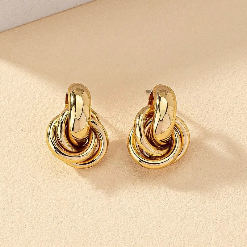 Gold and silver knot design hoop earrings – minimal and stylish
