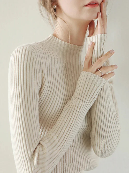 Woman wearing chic knitted turtleneck sweater – casual winter fashion outfit
